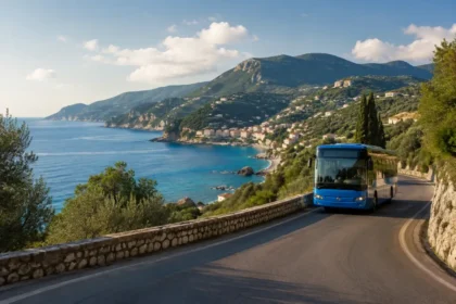 Bus traveling along a scenic coastal road above the Ionian Sea in Corfu