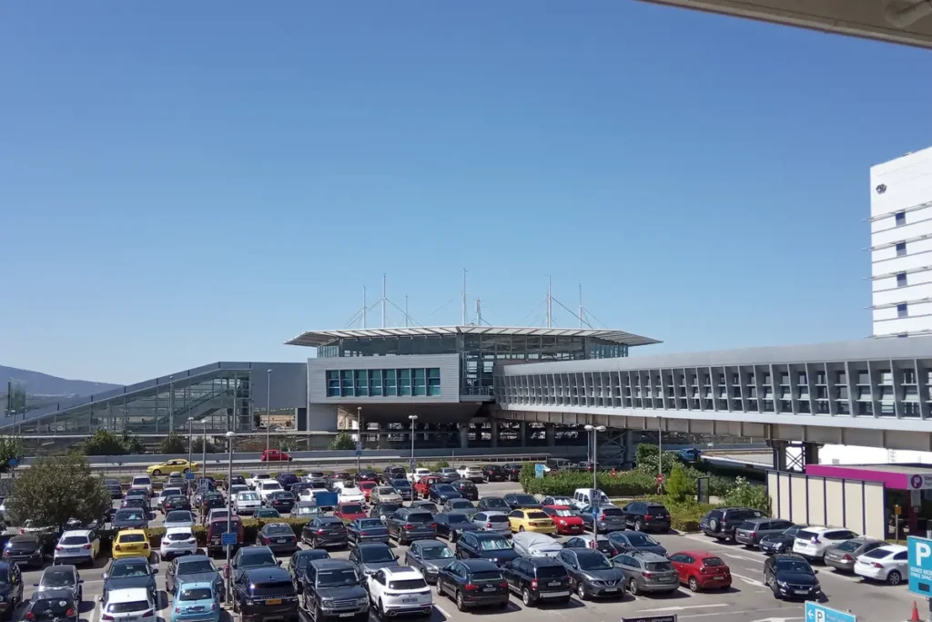 Athens Airport’s rail station and elevated covered walkway above the short-stay parking area.