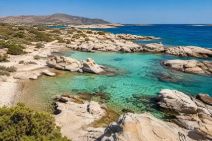 Turquoise swimming coves and sculpted granite rocks at Kolymbithres in Paros