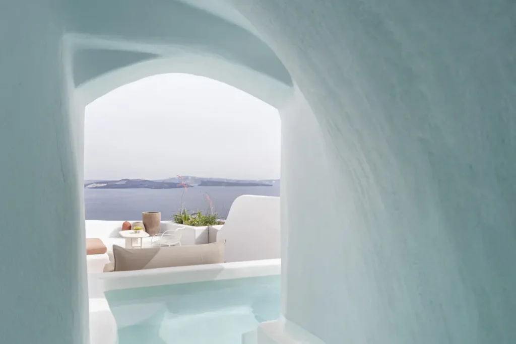 Sheltered cave pool opening toward the sea at the River Pool Suite at Canaves Ena.